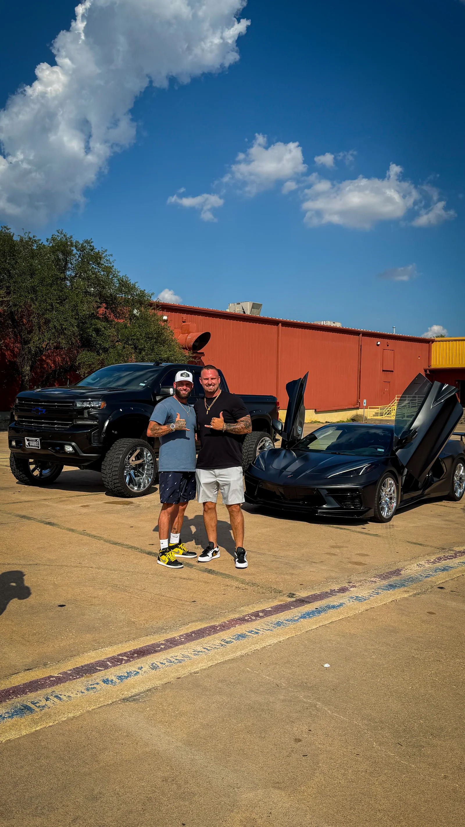 Brothers Tray and Coby with their Chevrolet Black Widow Limited and matching Corvette C8