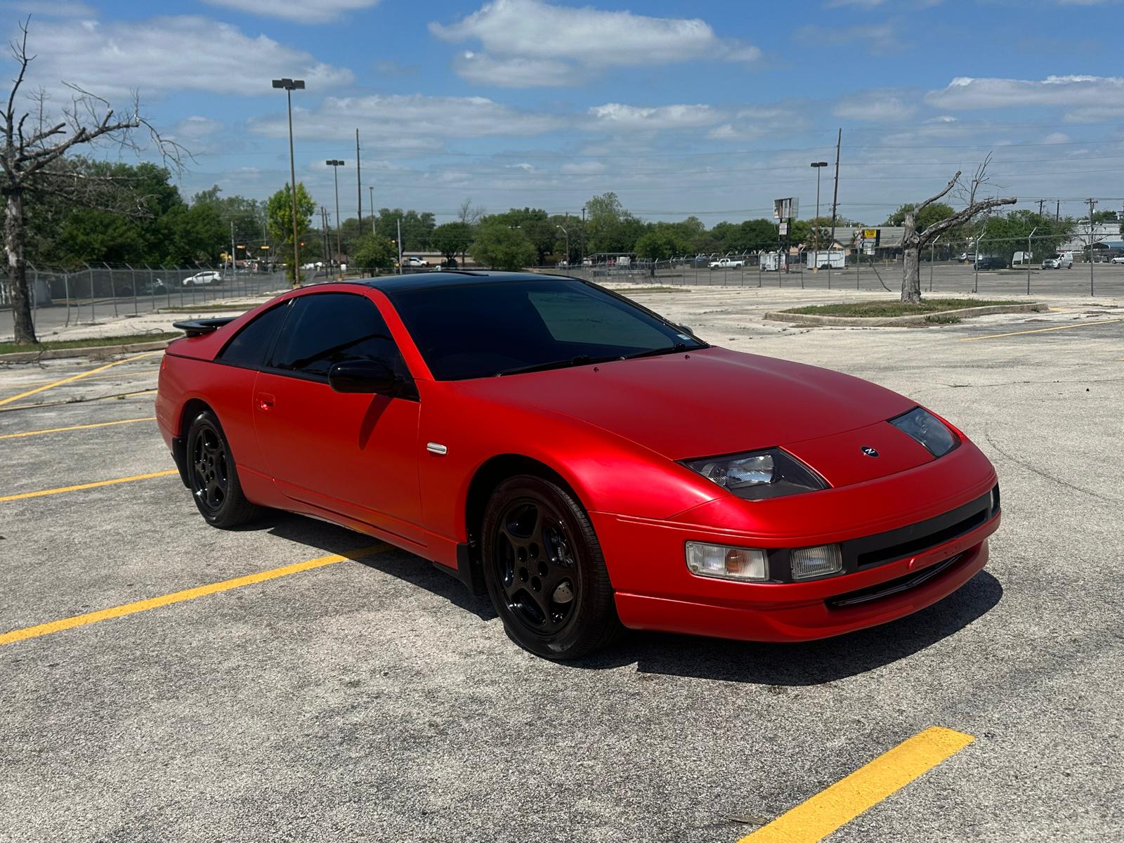 Red sports coupe front three-quarter view from the Phantom project archive