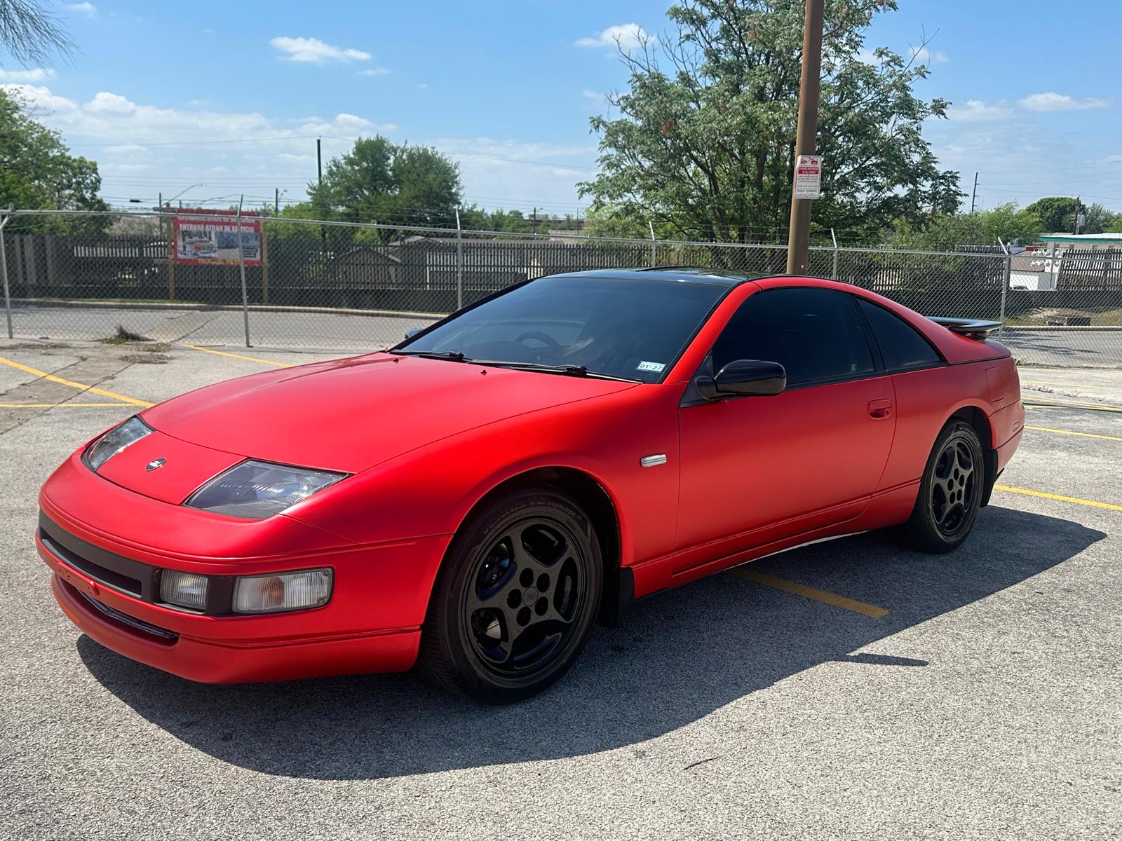 Rear view of the red sports coupe